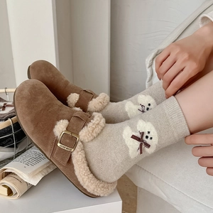 Brown suede mule slippers with warm shearling lining and cute puppy pattern socks