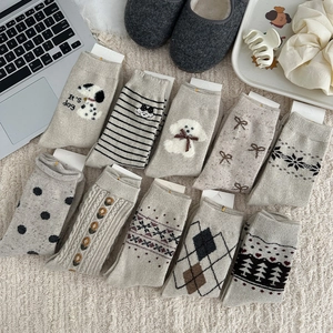 Set of 10 thick wool Fair Isle socks featuring cute puppy and bow patterns for winter