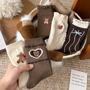 Detailed embroidery bear and lace ruffle on warm vintage brown wool socks for women