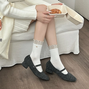 Sweet plaid ruffle socks with gold flower detail paired with grey tweed Mary Jane shoes