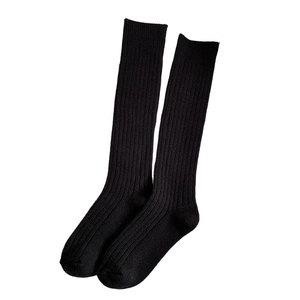 Classic black ribbed knit knee-high socks for women in soft autumn winter warm fabric