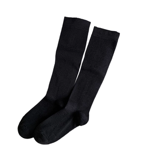 Classic black knee-high knitted socks with elastic ribbed cuffs for daily wear