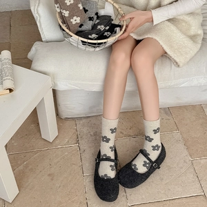Vintage floral wool socks for women in warm beige and grey tones with flower patterns