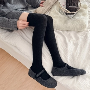 Winter over-the-knee knit socks in black with cozy thick thermal fleece material