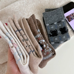 Thick winter knit socks set with cute bear patterns and fuzzy warm texture