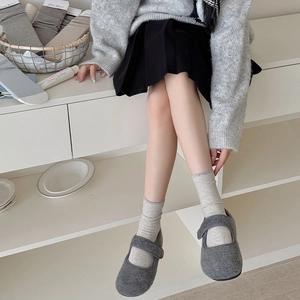 Breathable striped crew socks for women styled with felt Mary Jane shoes in soft grey
