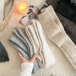 Vertical rib knit pattern details of grey and beige winter over-knee high socks