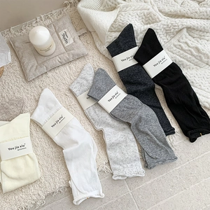 Set of five soft cotton calf socks in neutral white grey and black classic colors