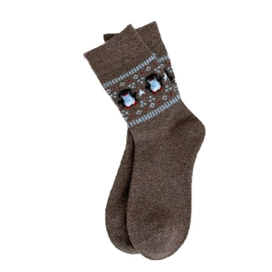 Thick warm dark brown knit socks with cartoon penguin and snowflake patterns