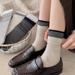 Japanese style striped crew socks for women in various colors with a double-layer cuff