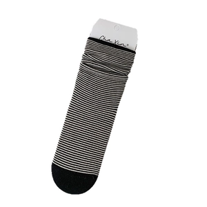 Mid-calf black and white striped cotton knit socks with solid black toe and brand tag