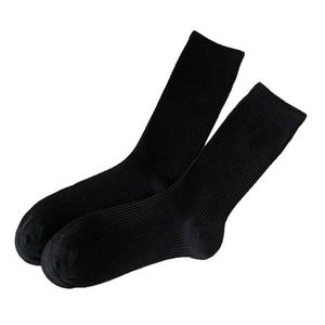 Classic black ribbed knit crew socks with minimalist vertical texture for women