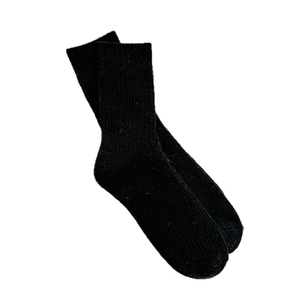 Black ribbed wool crew socks for women, thick thermal knit design for winter comfort