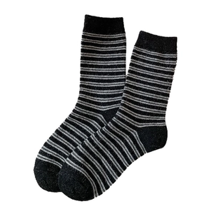 Thick wool striped crew socks in black and grey with warm ribbed cuffs for women