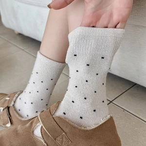Cute beige polka dot wool crew socks for women with warm ribbed cuffs and soft elasticity