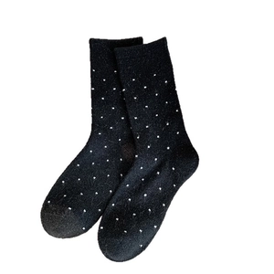Chic black polka dot mid-calf wool socks for women in minimalist autumn style