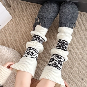 Fair Isle pattern knit leg warmers in cream white with black snowflake nordic design