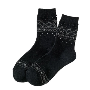 Calze vintage in lana con motivo a fiocchi di neve nordico nero per l'inverno