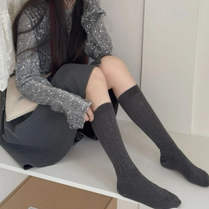 Deep grey ribbed long socks for women featuring minimalist Japanese slouchy knit style