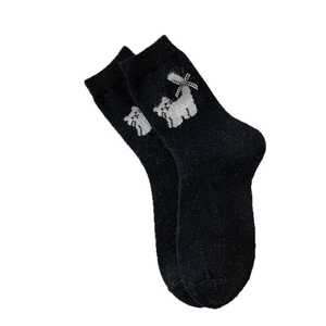 Cozy black mid-calf wool socks featuring cute white cat patterns and plaid bows for women
