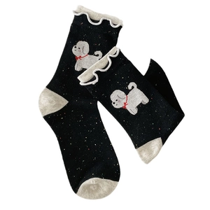 Cute black crew socks with white ruffles and cartoon dog pattern with colorful speckles