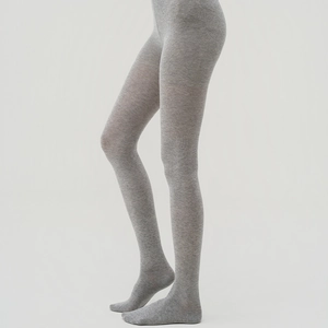 Detailed view of grey vertical ribbed knit texture on high-quality slimming cotton tights