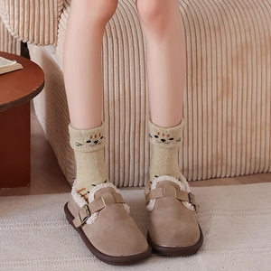 Warm thick wool socks with cat embroidery paired with brown fleece-lined clogs