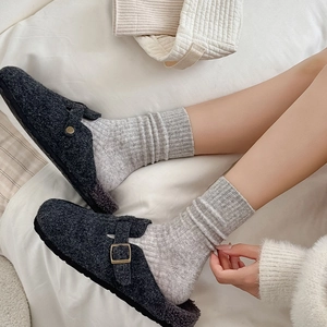 Deep grey textured wool clogs with adjustable bronze buckle and warm plush lining