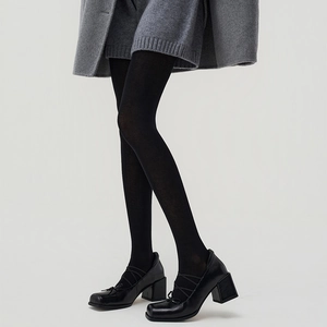 Chic black opaque tights with platform Mary Jane shoes for autumn winter fashion look