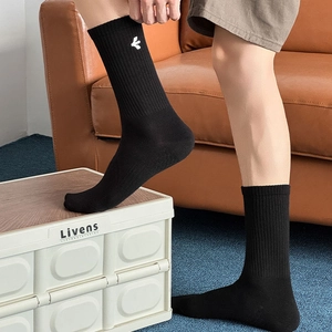Men's cotton ribbed crew socks in black featuring a white embroidered bird logo