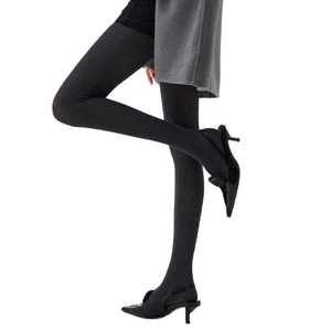 Slim fit dark grey knit tights with vertical texture paired with black stilettos