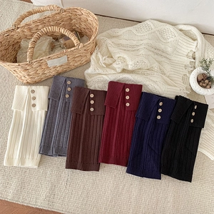 Vertical ribbed knit leg warmers with cuff buttons available in six seasonal colors