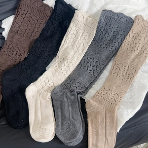 Chic hollow knit knee-high socks for women in multiple colors with diamond patterns