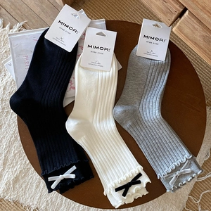 Three-pack velvet bow mid-calf socks with ruffle trim in black white and gray