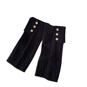 Japanese style black ribbed leg warmers with wood buttons and a stylish split cuff design