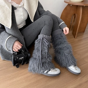 Furry dark grey leg warmers with ribbon bows for Y2K winter style outfits