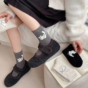 Cozy cartoon cat fleece crew socks for women featuring cute white cats and blue bows