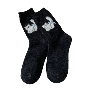 Cute black cat flocking crew socks with fluffy bow design for winter warmth