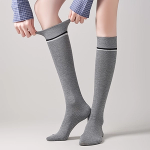 Grey knee-high varsity style socks with striped rib cuffs for a classic JK school look