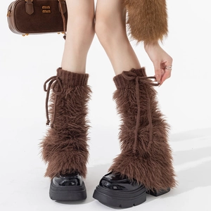 Jambières en fausse fourrure marron avec revers tricotés et nœuds style JK