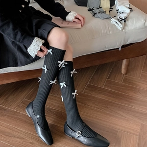 Japanese style black ribbed knee-high socks with cute white bows for women