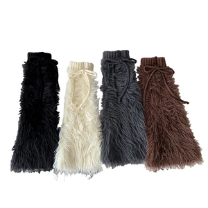 Furry leg warmers with bows available in black, cream, grey and brown colors