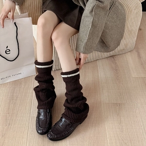 Brown striped knit leg warmers for women in retro preppy style with ribbed texture
