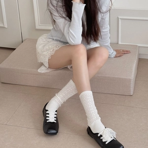 Japanese style white hollow knit mid-calf socks with V-shape pattern and black shoes