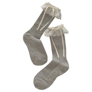 Grey knit mid-calf socks featuring white lace trim and creamy ribbon bows for a Lolita style