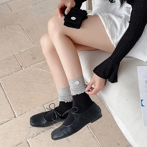 Blue-grey contrasting layered knit socks with frill trim and vintage Mary Jane shoes