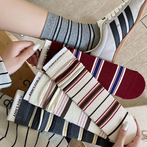 Detail of vintage striped crew socks showing multiple color options and knitted texture