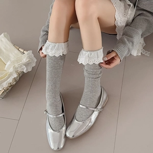 Sweet ballet style gray knitted calf socks with white lace trim and silver Mary Jane shoes