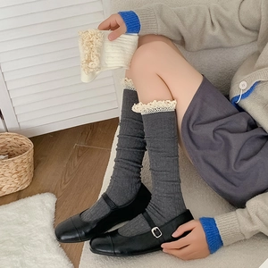 Retro grey ribbed knee high socks with beige lace trim and knit texture for women