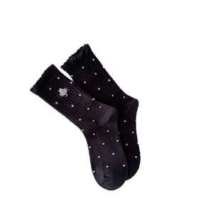 Cute black polka dot crew socks with cat embroidery and ruffled cuffs for women